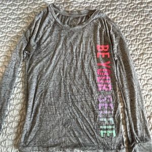 Heather grey long sleeve shirt with wording. Size 16